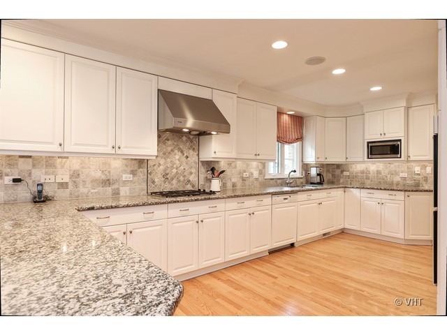 318 Forest Road Hinsdale, IL 60521 - Photo 5 of 23 a kitchen with granite countertop a sink cabinets and wooden floor