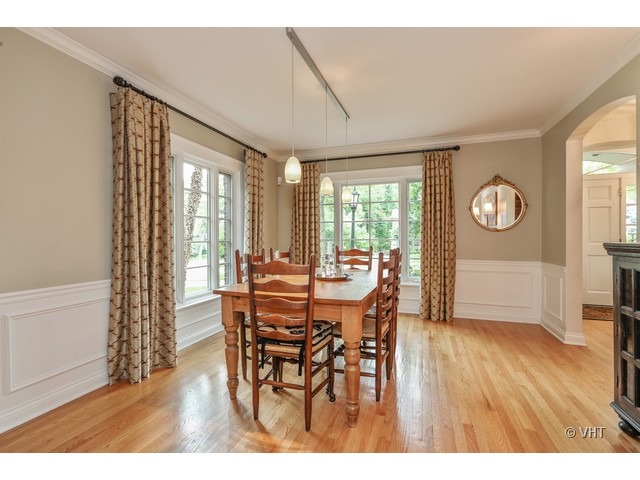 318 Forest Road Hinsdale, IL 60521 - Photo 6 of 23 a view of a dining room with furniture and wooden floor