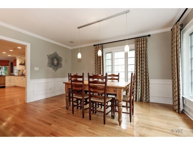 318 Forest Road Hinsdale, IL 60521 - Photo 7 of 23 a view of a dining room with furniture and wooden floor