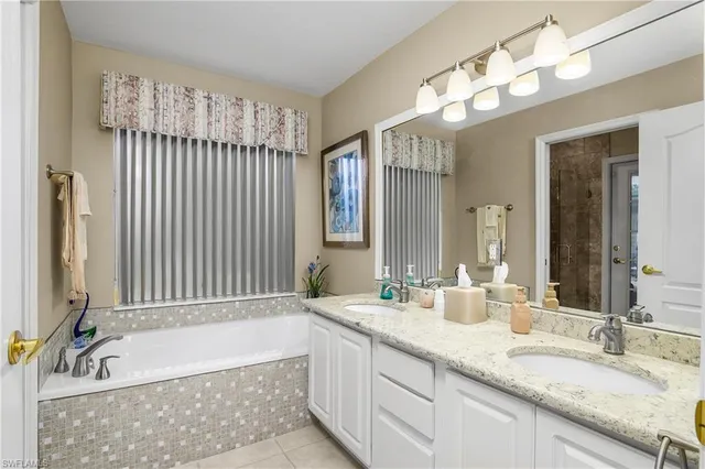 a bedroom with a bed and furniture