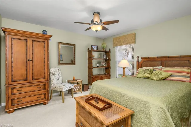 a bathroom with a granite countertop sink a large mirror and a