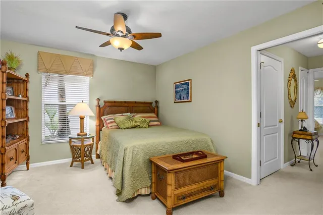 a bedroom with a bed and furniture