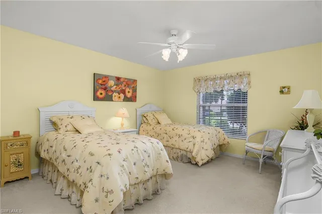 a bathroom with a sink vanity granite and a mirror