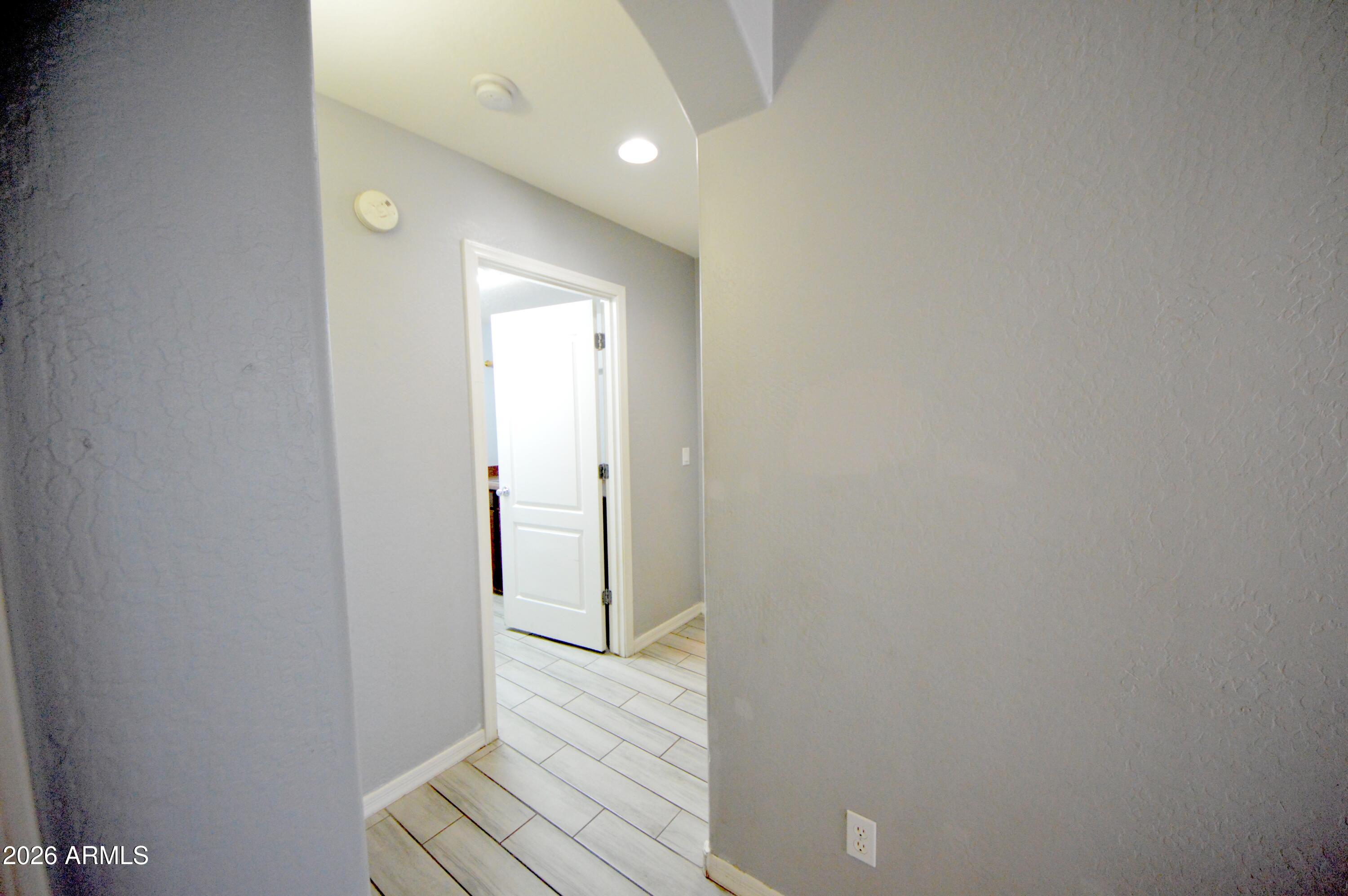 5115 West Novak Way Laveen, AZ 85339 - Photo 18 of 52 Down Stairs Hall Way