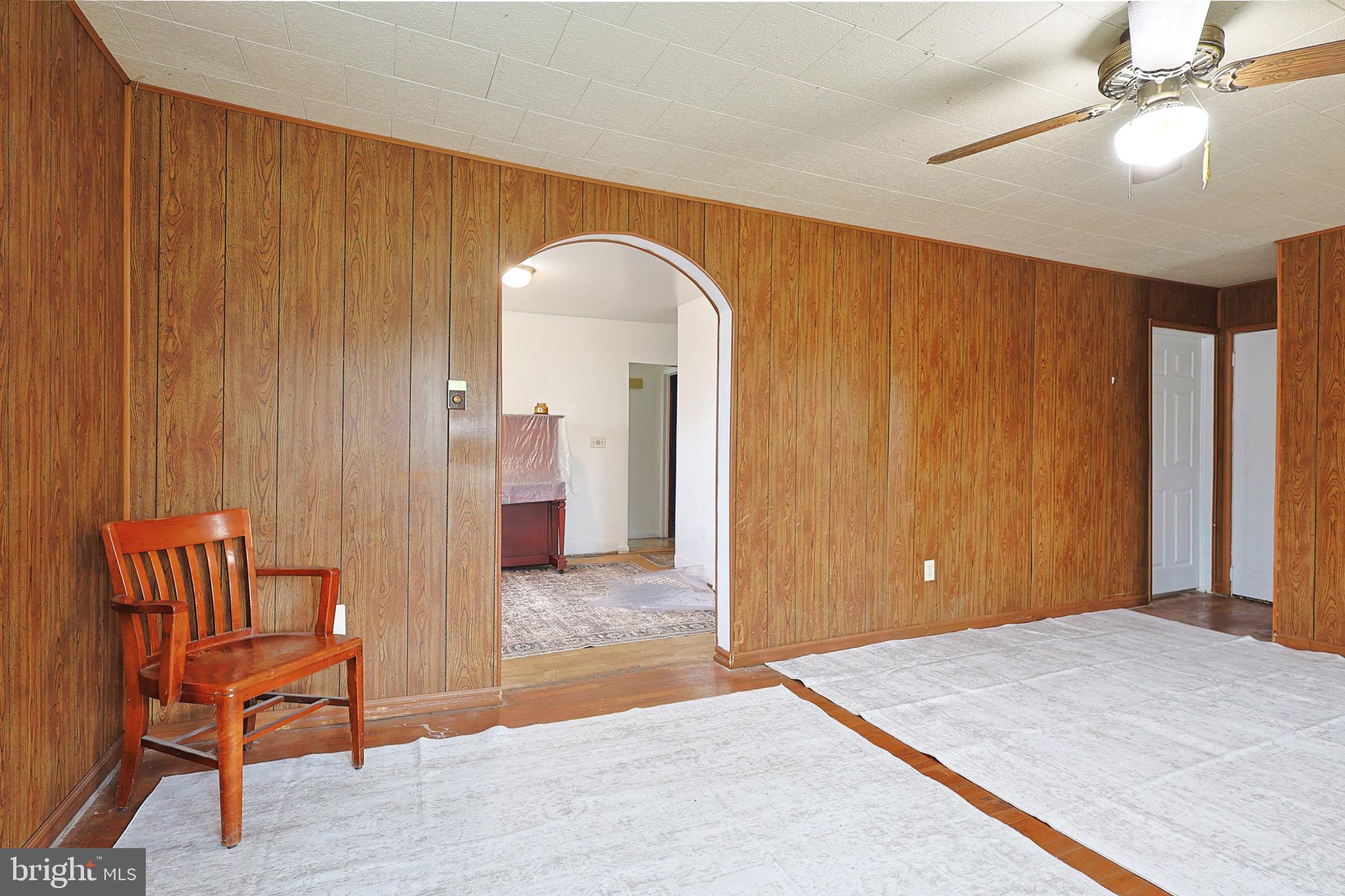 159 Rocket Center Road Keyser, WV 26726 - Photo 10 of 64 a view of a livingroom with furniture and staircase