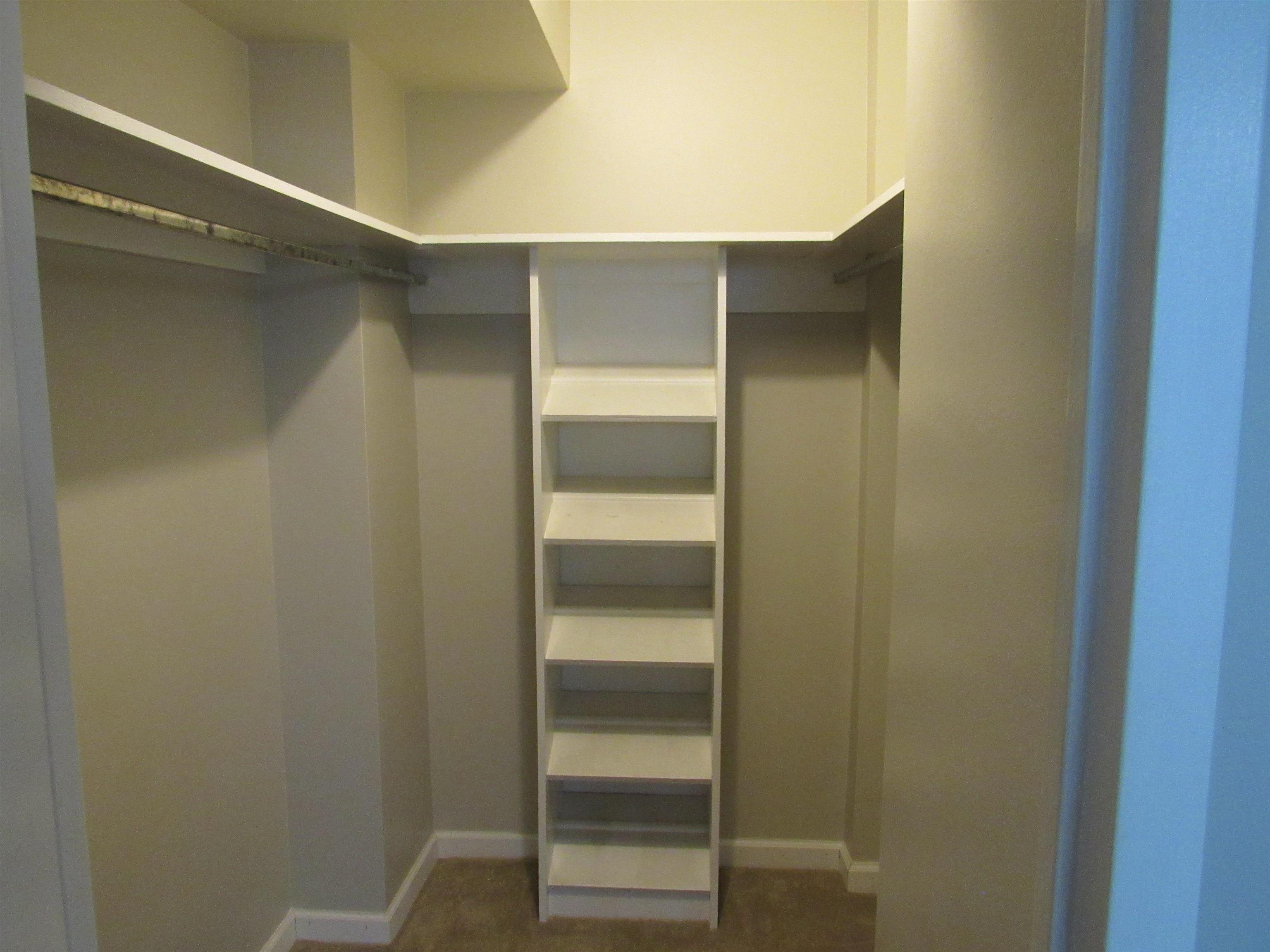 3080 Walnut Grove Road, Unit 205 Memphis, TN 38111 - Photo 20 of 26 a view of walk in closet with empty racks