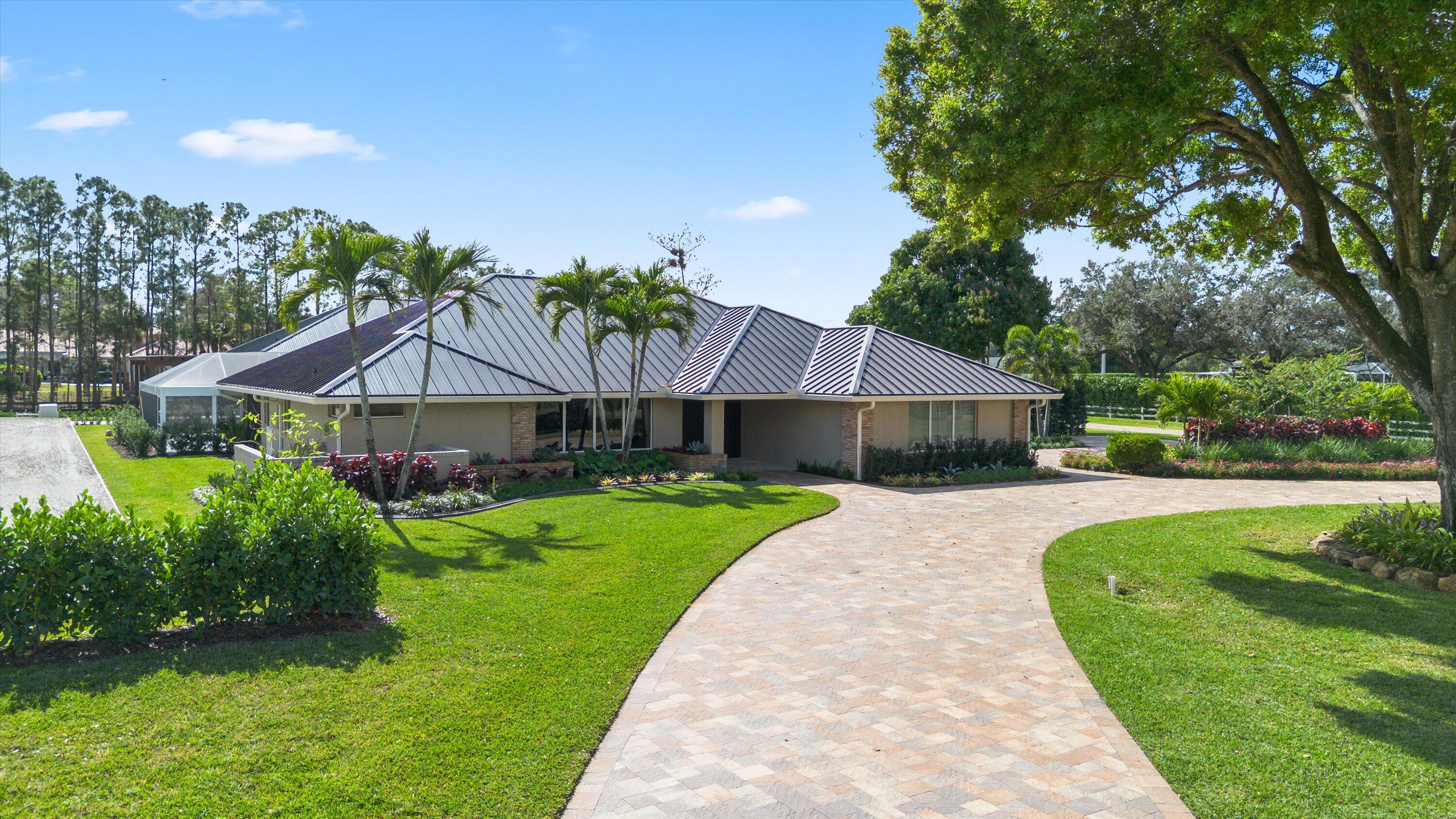 14598 Halter Road Wellington, FL 33414 - Photo 2 of 61 02-DJI_0382