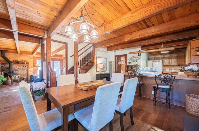 a kitchen that has a lot of cabinets in it