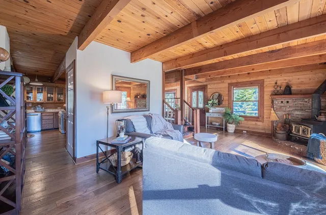 a view of balcony with wooden floor