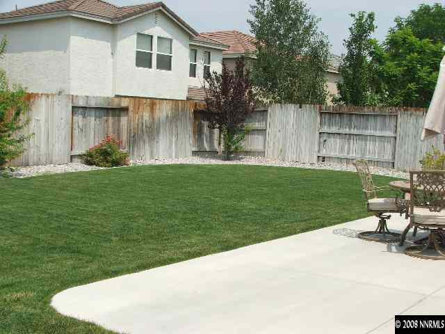 1773 River Gorge Drive Reno, NV 89521 - Photo 7 of 8 a view of a house with backyard and sitting area