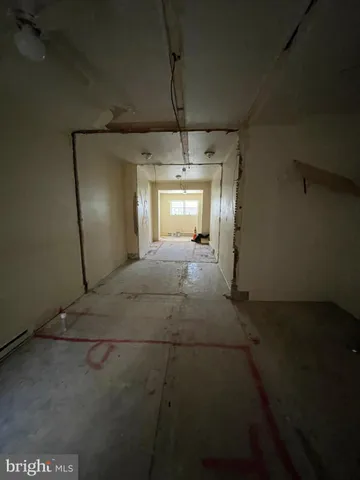 wooden floor with a rug