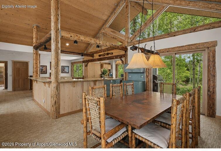 818 Faraway Road Snowmass Village, CO 81615 - Photo 3 of 35 a view of a patio with a table and chairs