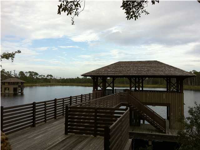 9-1 Draper Lake Santa Rosa Beach, FL 32459 - Photo 4 of 4 a terrace of a house with outdoor seating