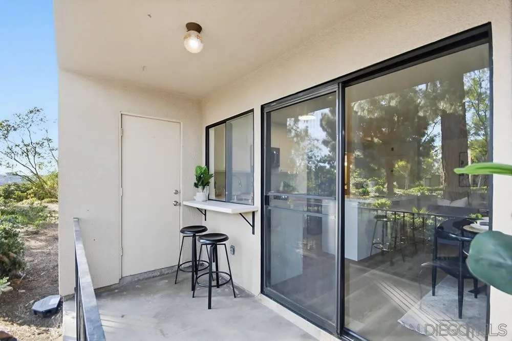 7858 Cowles Mountain Court, Unit D7 San Diego, CA 92119 - Photo 31 of 40 a room with furniture and a window