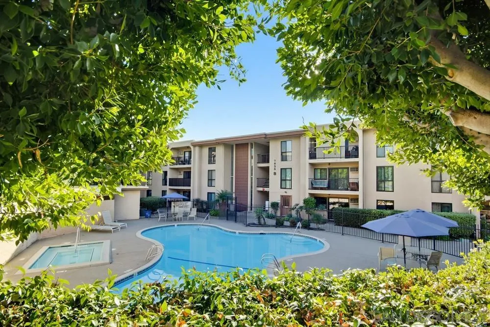 7858 Cowles Mountain Court, Unit D7 San Diego, CA 92119 - Photo 39 of 40 a view of a house with a yard and sitting area