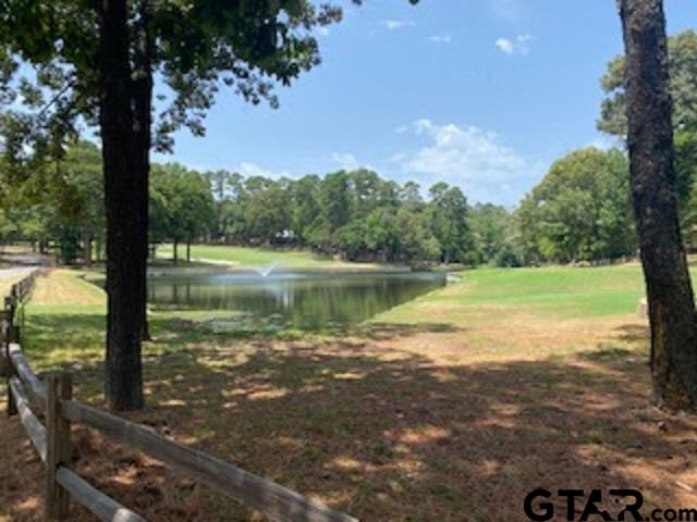 Tbd Lamplight Path Holly Lake Ranch, TX 75765 - Photo 9 of 15 a view of a lake from a yard
