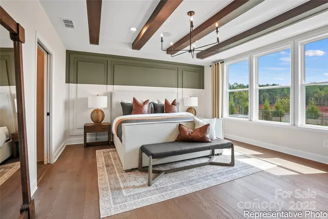 a bathroom with a double vanity sink mirror and toilet
