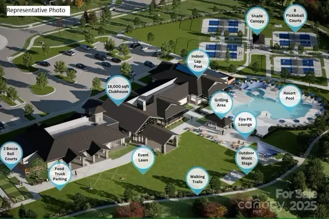 a living room with fireplace furniture and a large window