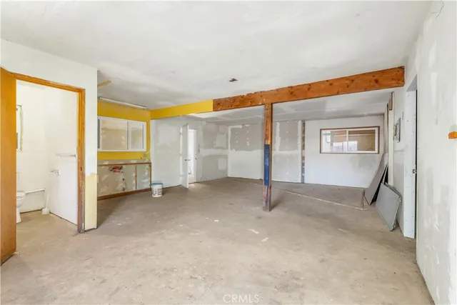 an empty room with windows