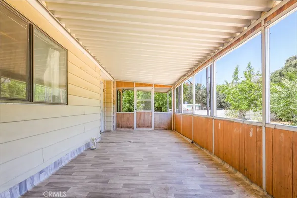 a view of an outdoor space with a large window