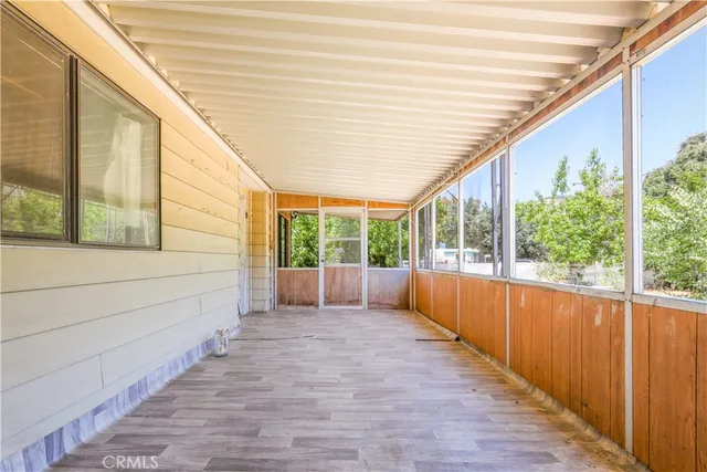 a view of an outdoor space with a large window