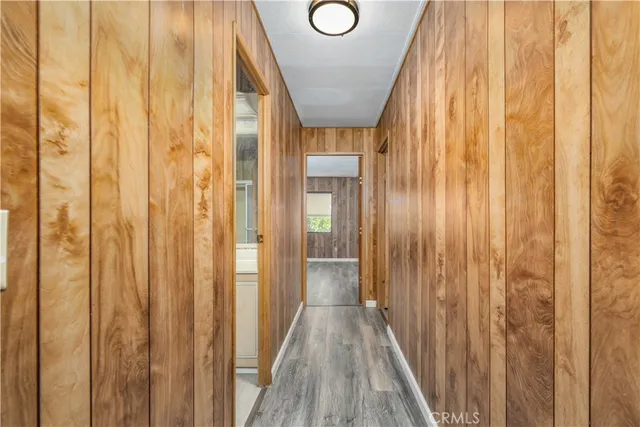 a view of a bathroom with shower and window