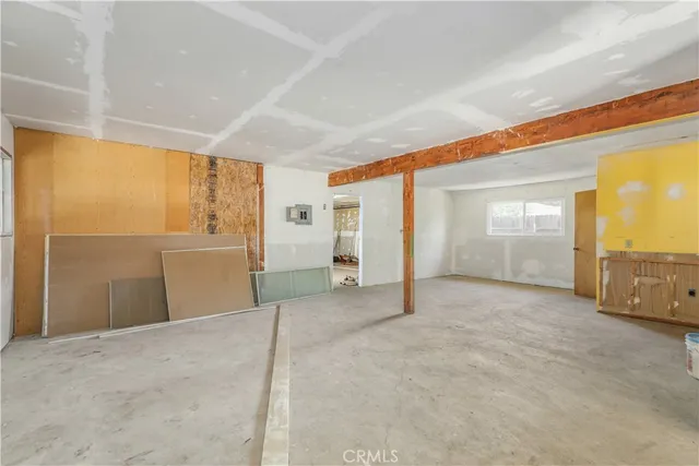 a view of a livingroom with wooden floor