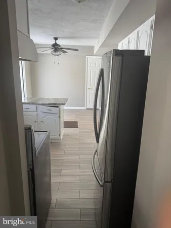 a bathroom with a shower and a toilet