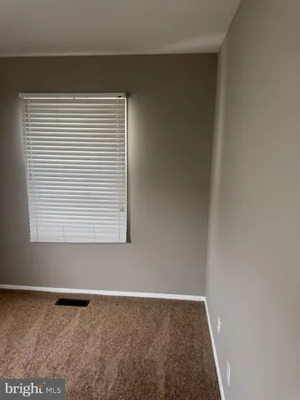 a view of a small space with a window