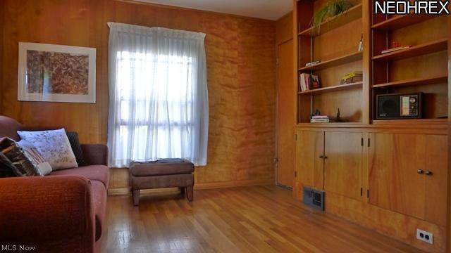 16406 Fernway Road Cleveland, OH 44120 - Photo 7 of 21 First floor Family Room/Den with hardwood floors