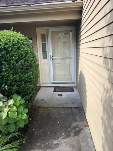 a view of entrance gate of a house