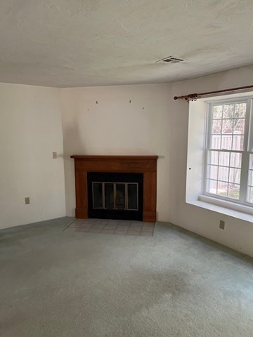 920 Ridgefield Circle, Unit C Clinton, MA 01510 - Photo 7 of 26 a view of empty room with a fireplace