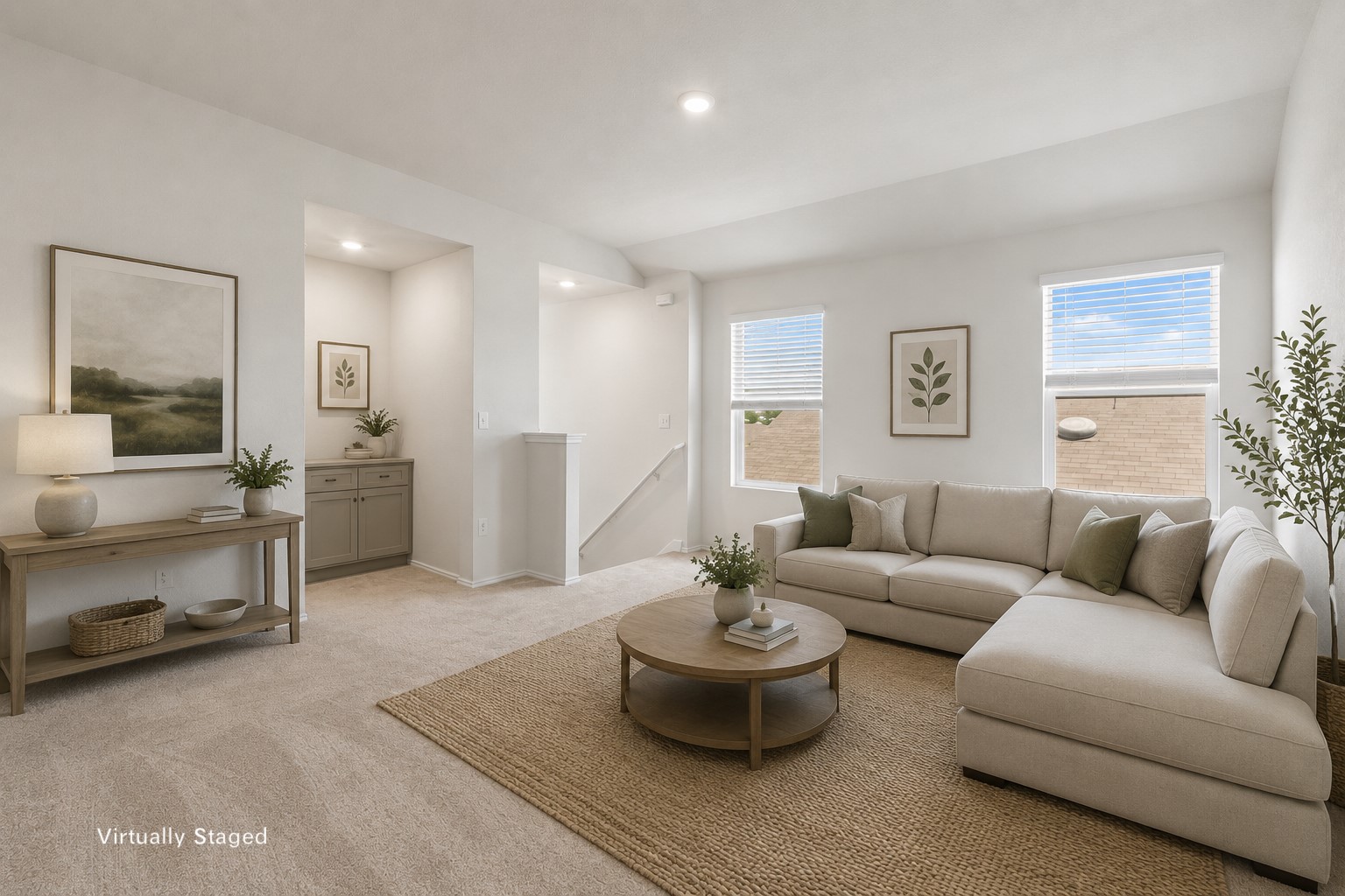 14917 Bajada Rd Manor Manor, TX 78653 - Photo 18 of 31 2nd floor Bright living area featuring neutral carpeting and a light-toned sectional
