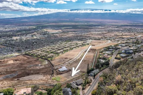 a view of an ocean and city