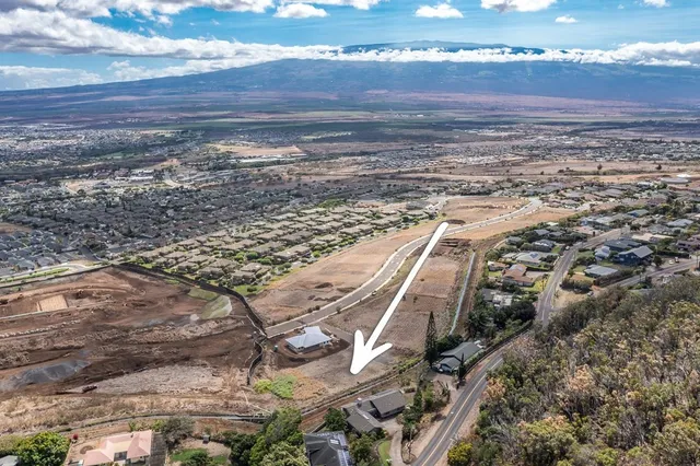 a view of an ocean and city