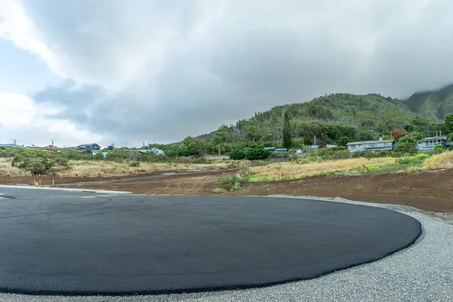 a view of a lake with a big yard