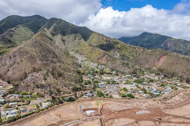 a view of mountain view with mountains in the background
