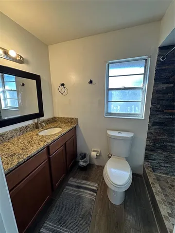 a view of a lake with outdoor space