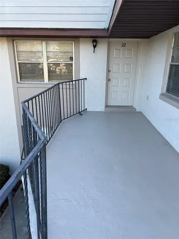 a view of backyard with deck