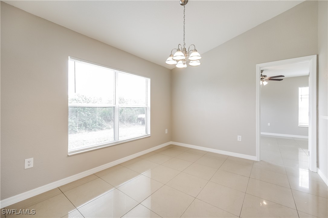 404 Willowbrook Drive Lehigh Acres, FL 33972 - Photo 6 of 16 a view of livingroom with window