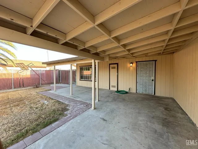 a view of a backyard of the house
