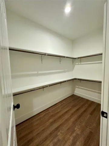 a black and white photo of a black white wall