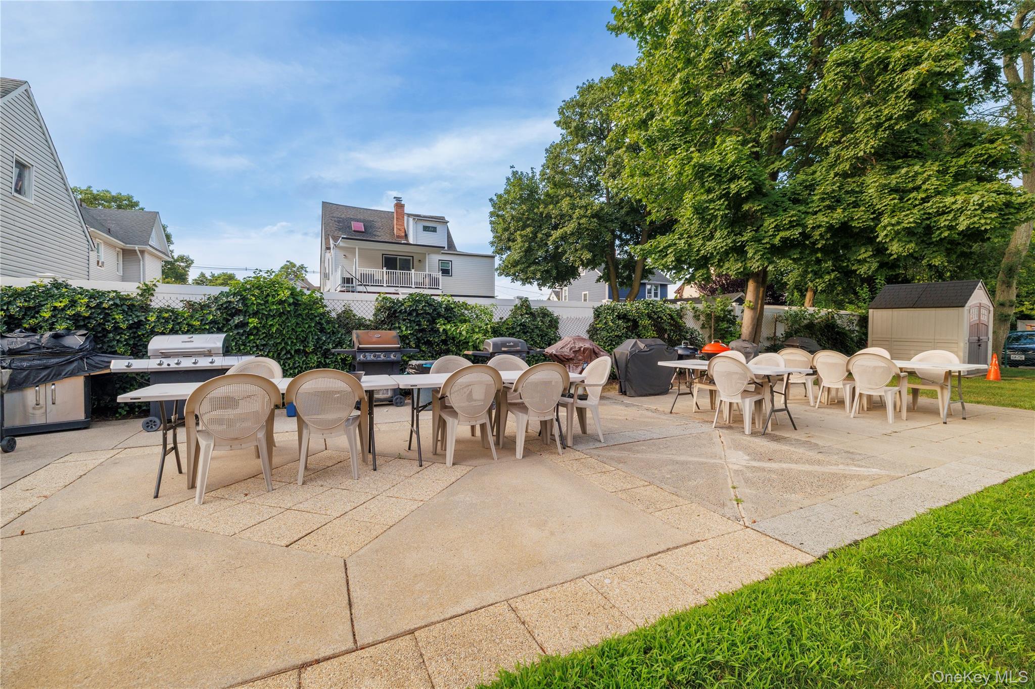 250 West Merrick Road, Unit 1E Freeport, NY 11520 - Photo 21 of 23 Community patio area.