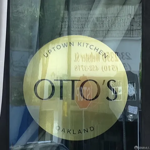 a kitchen with granite countertop white cabinets and sink