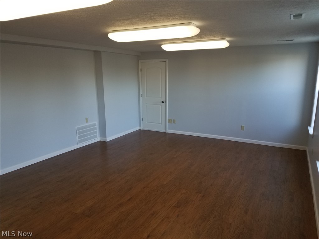 2159 Meloy Road Kent, OH 44240 - Photo 27 of 33 Living Room in the In Law Suite. The extra door leads to a great storage area that has an overhead garage door.