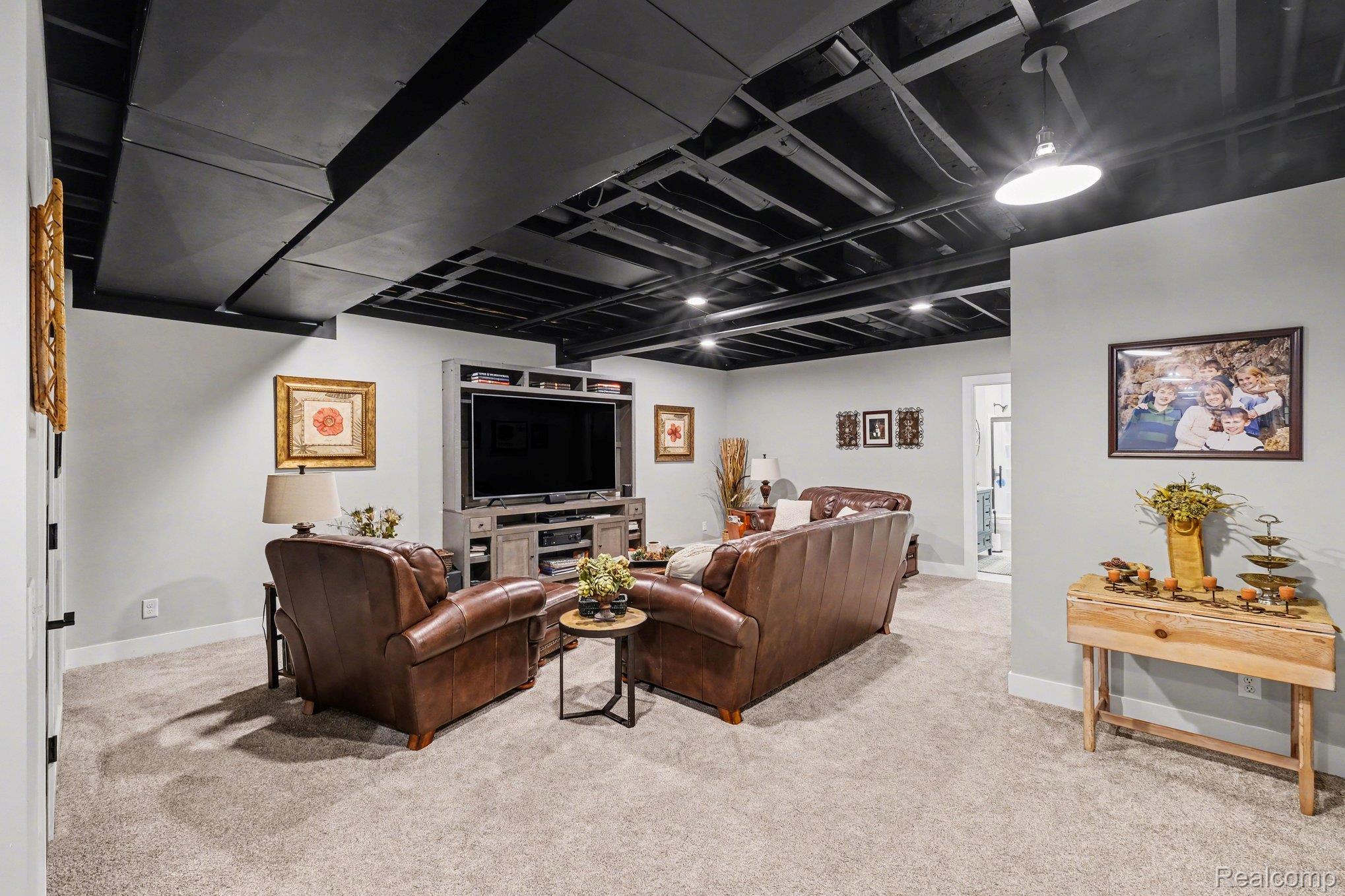 9084 Copper Ridge Drive Davison, MI 48423 - Photo 32 of 42 Living room with light carpet and baseboards