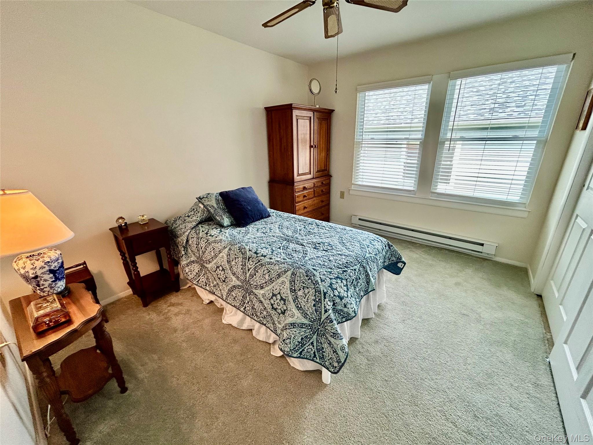 520 Cranston Lane Ridge, NY 11961 - Photo 16 of 18 Bedroom with double closets
