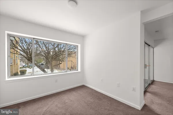a kitchen with stainless steel appliances granite countertop a sink and a refrigerator