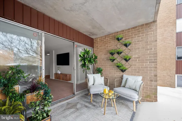a bedroom with bed and window