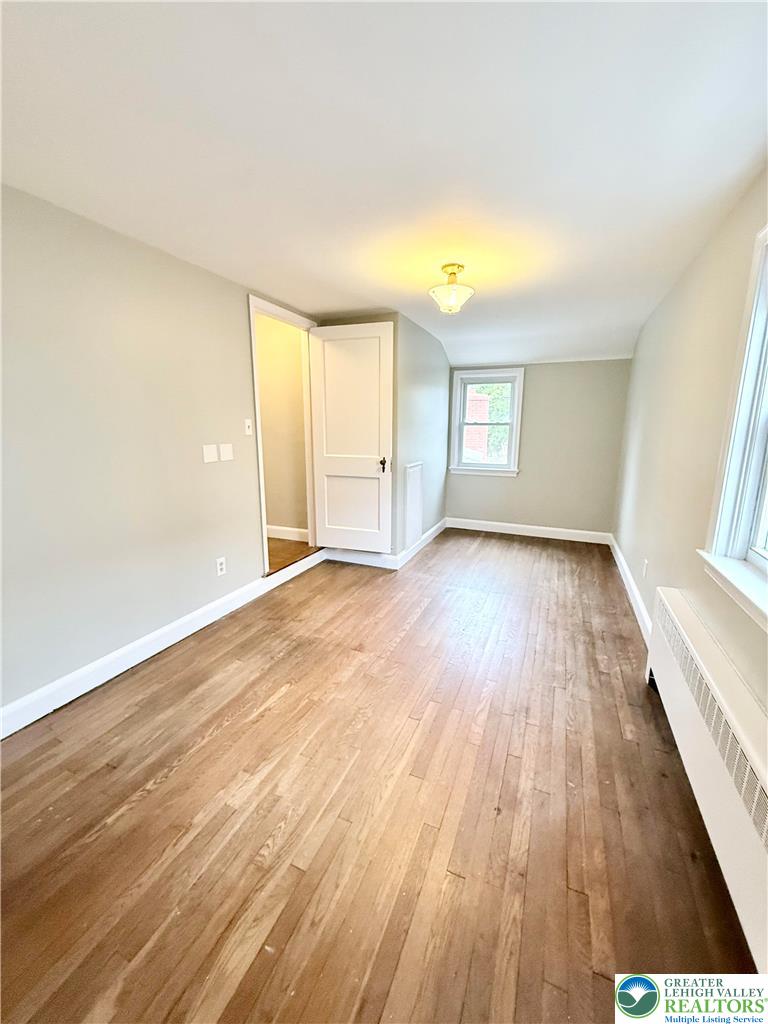 2109 Kemmerer Street Bethlehem, PA 18017 - Photo 20 of 41 an empty room with wooden floor and windows